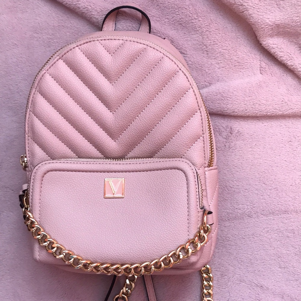 Victoria’s Secret back pack purse blush pink with gold hardware.